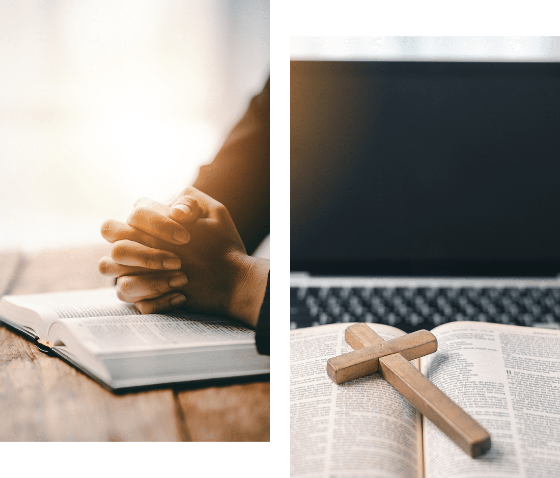 Hands praying over an open Bible