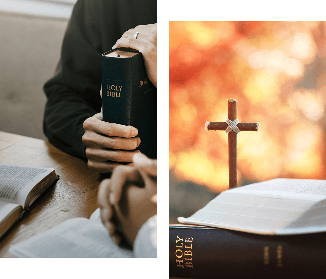 Hands holding a Bible while praying