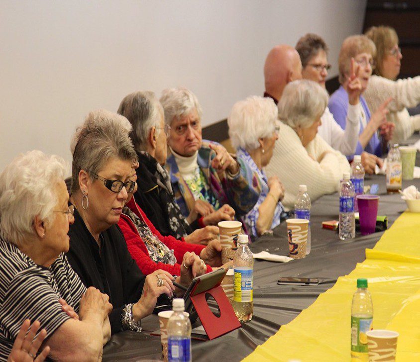 Seniors enjoying a social event together